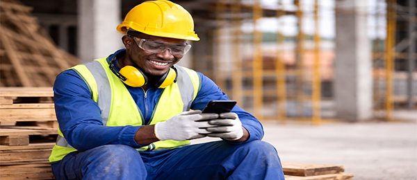 A construction worker wearing worksafe garmet